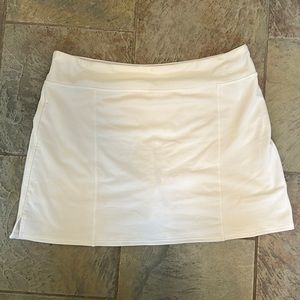Women’s Adidas white golf skort, size large.